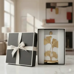 Michael Aram paper towel holder in signature luxury gift box packaging.