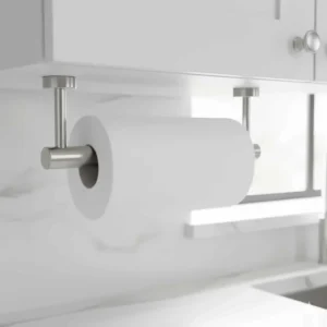 Close-up view of an under-cabinet stainless steel paper towel holder with a brushed finish, emphasizing the sturdy mounting hardware.